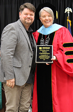 Brian Christianson poses with Marsha Danielson