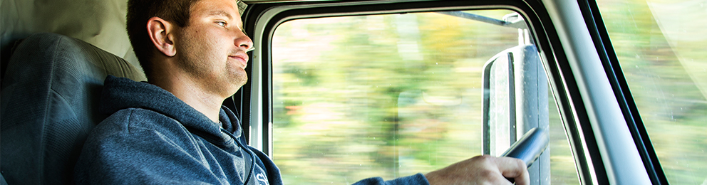 Driver in the cab of a truck