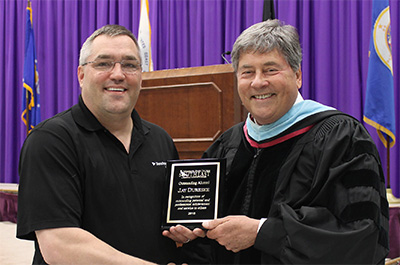 Jay Dureske (left) poses for photo with Interim President Larry Lundblad 