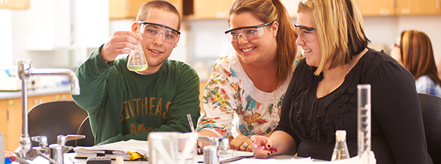 Three Students in Science Lab