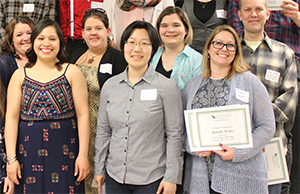 A group of people who are scholarship winners