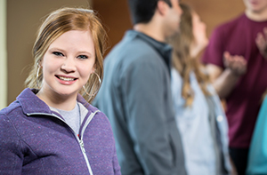 Young student smiling at the camera